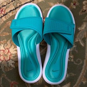 Turquoise Nike Slides